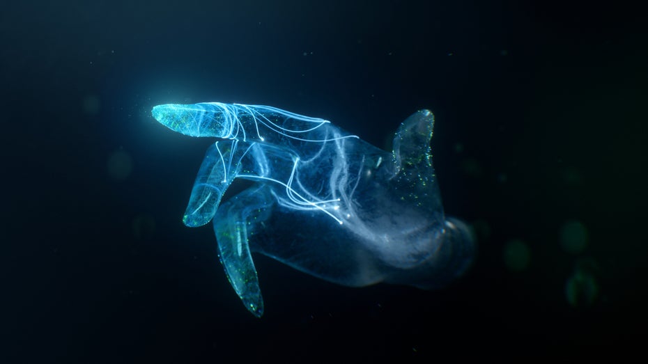 „Grief-Tech“ heißt der Begriff der Stunde: Mittels künstlicher Intelligenz sollen Trauernde mit einer virtuellen Form der Verstorbenen interagieren können. (Bild: Shutterstock.com / Eugene Shestopalov) Eine holografische Hand streckt den Zeigefinger aus (Bild: Shutterstock.com / Eugene Shestopalov)