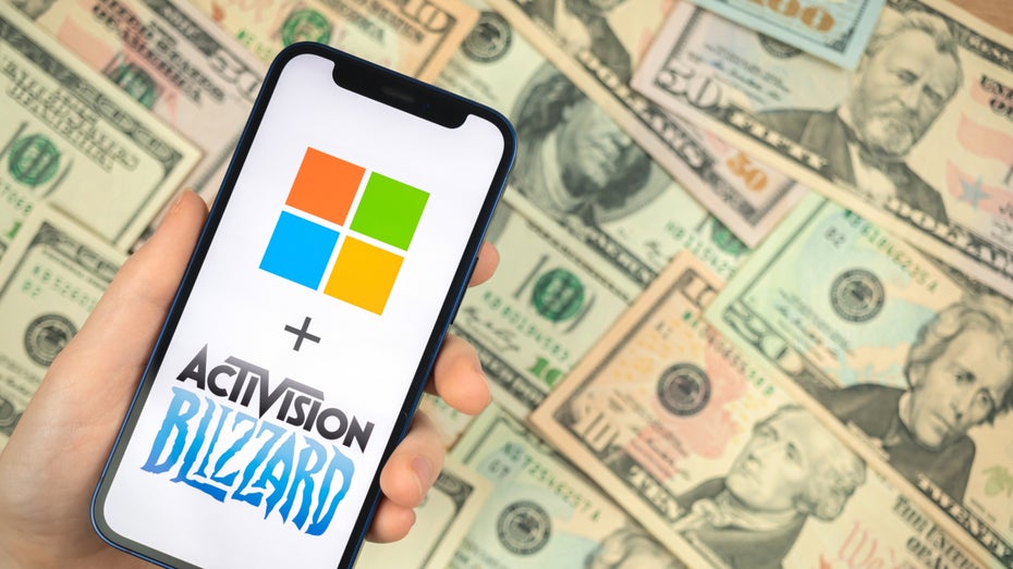 Katsching – mit nur einer „kleinen“ Übernahme ist Microsofts Portfolio an Milliarden-Franchises angewachsen. (Foto: Shutterstock / FellowNeko) Nach Activision-Kauf: 13 Milliarden-Franchises, die jetzt Microsoft gehören