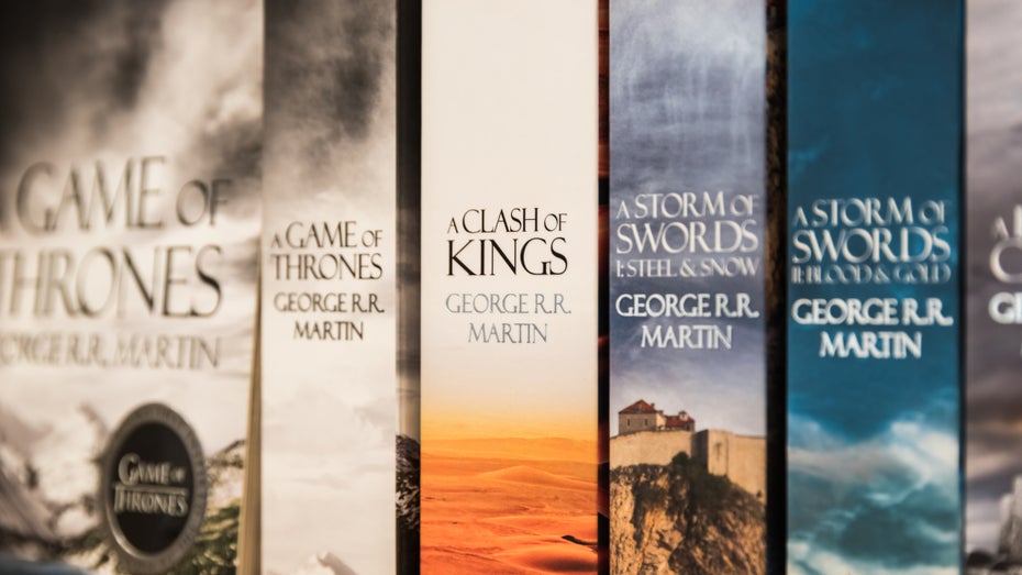 George R.R. Martin lässt sich Zeit mit der Fortsetzung von „Game of Thrones“ – also hat eine KI schon mal vorgelegt. (Foto: Radu Bercan/Shutterstock) KI Martin Game of Thrones