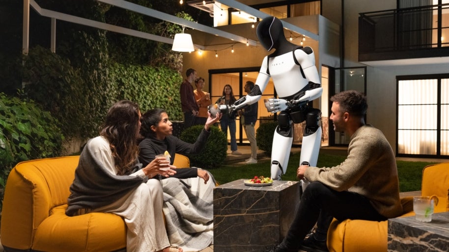 Tesla-Roboter Optimus reicht Getränke – aber was kann er wirklich? (Foto: Tesla) Optimus-Illusion: Wie Tesla seine Roboter-Show mit Tricks aus den 50ern aufpolierte